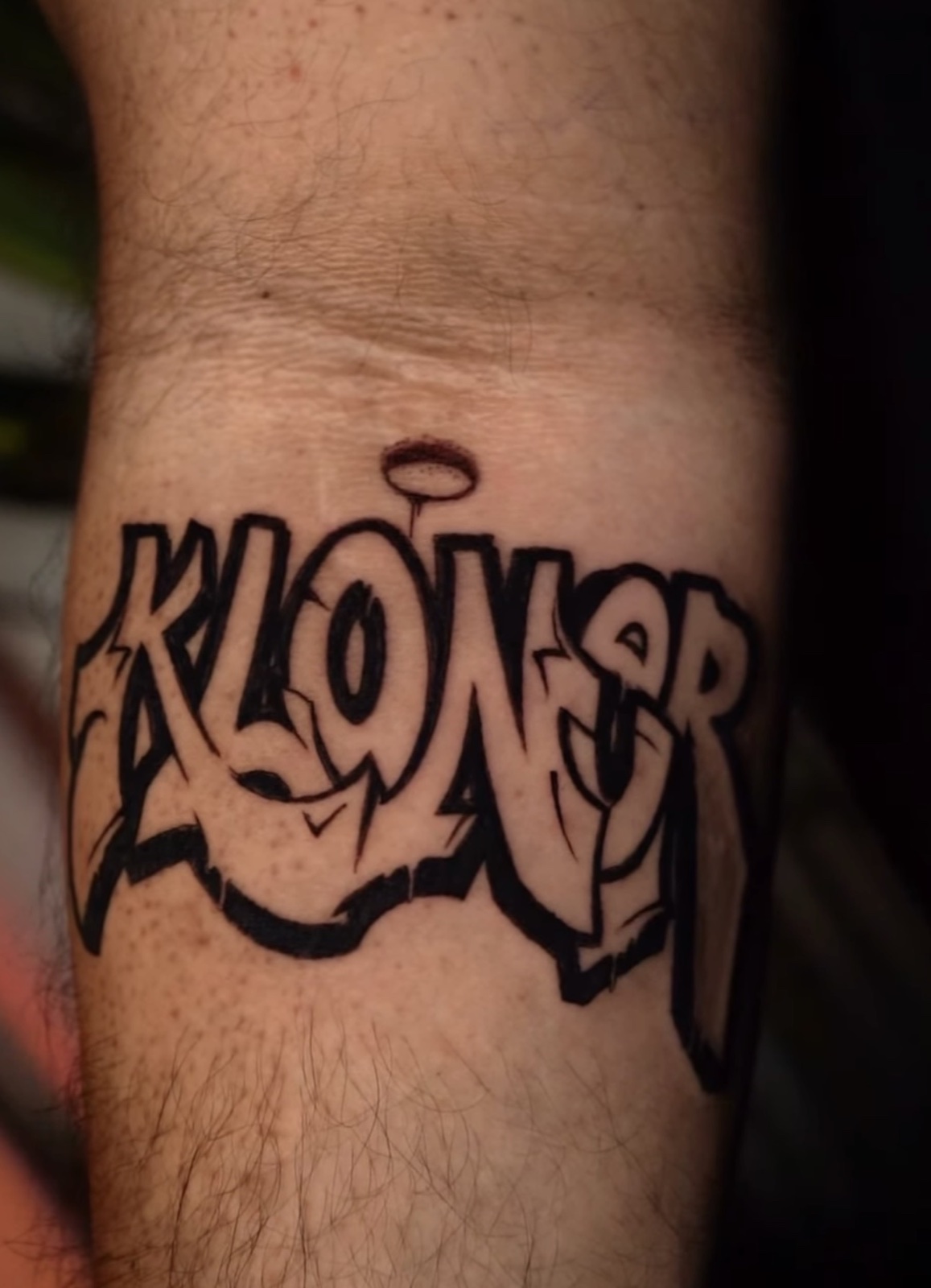 Freehand Lettering tattoo work by Damien