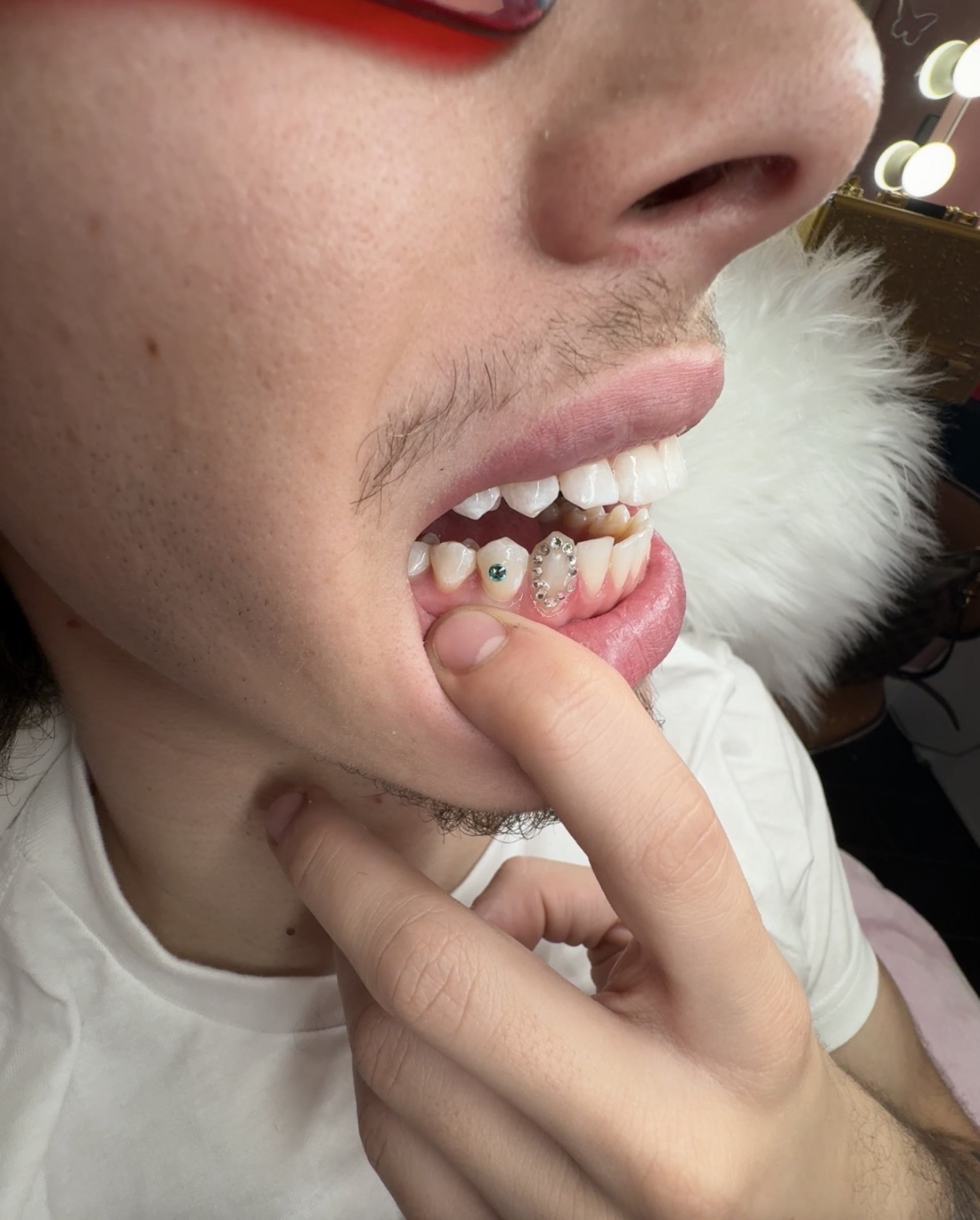 Tooth Gem Artistry tattoo work by Janet