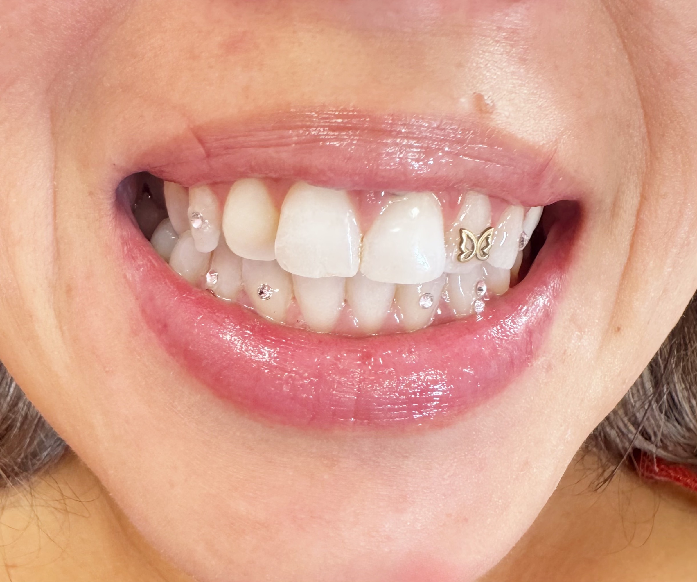 Tooth Gem Artistry tattoo work by Janet